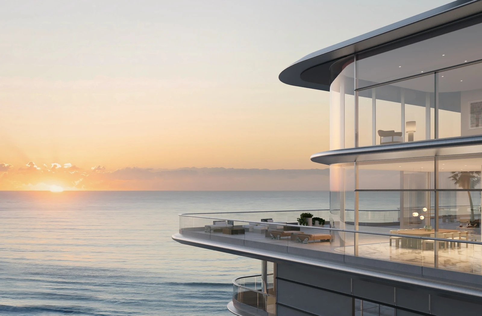 Curved seafront terrace at sunrise with open water horizon