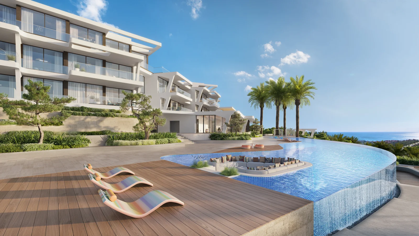 Marea Missoni community infinity pool deck with curved edge and building facade, Casares Costa del Sol