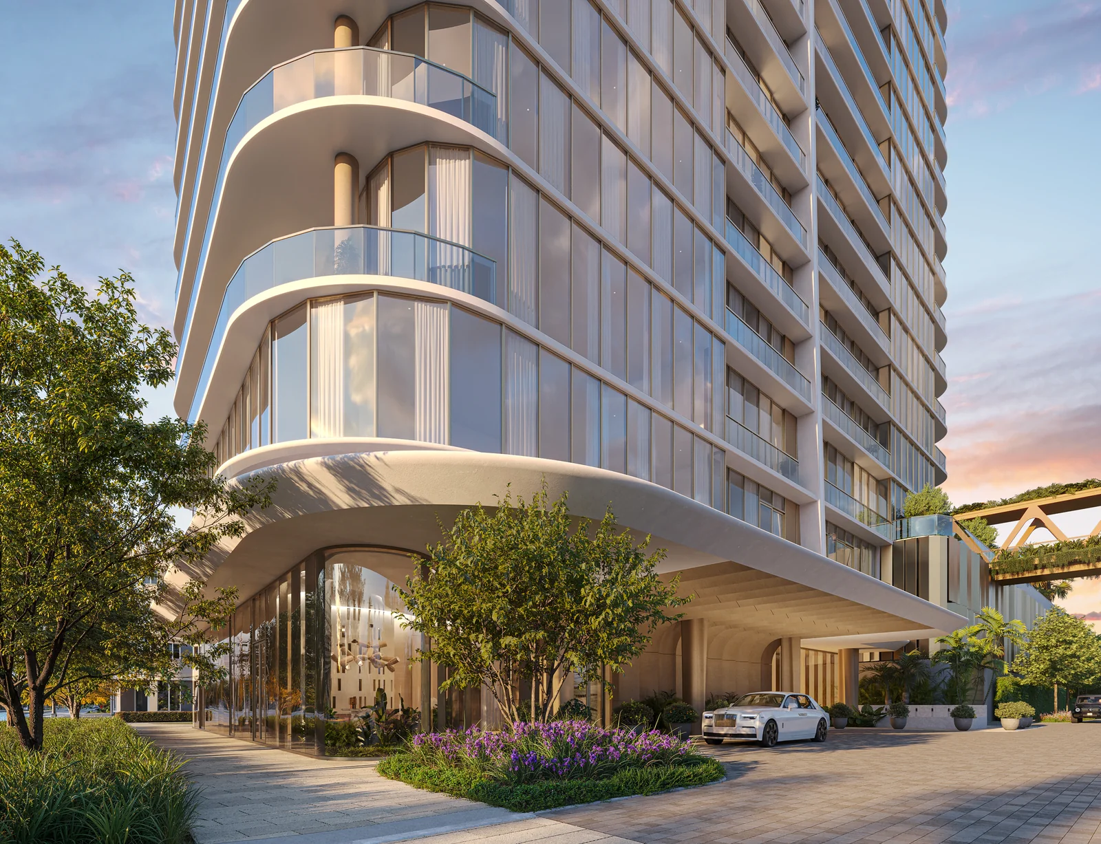 Kempinski Residences Miami Design District porte-cochere arrival with water features at dusk, Miami