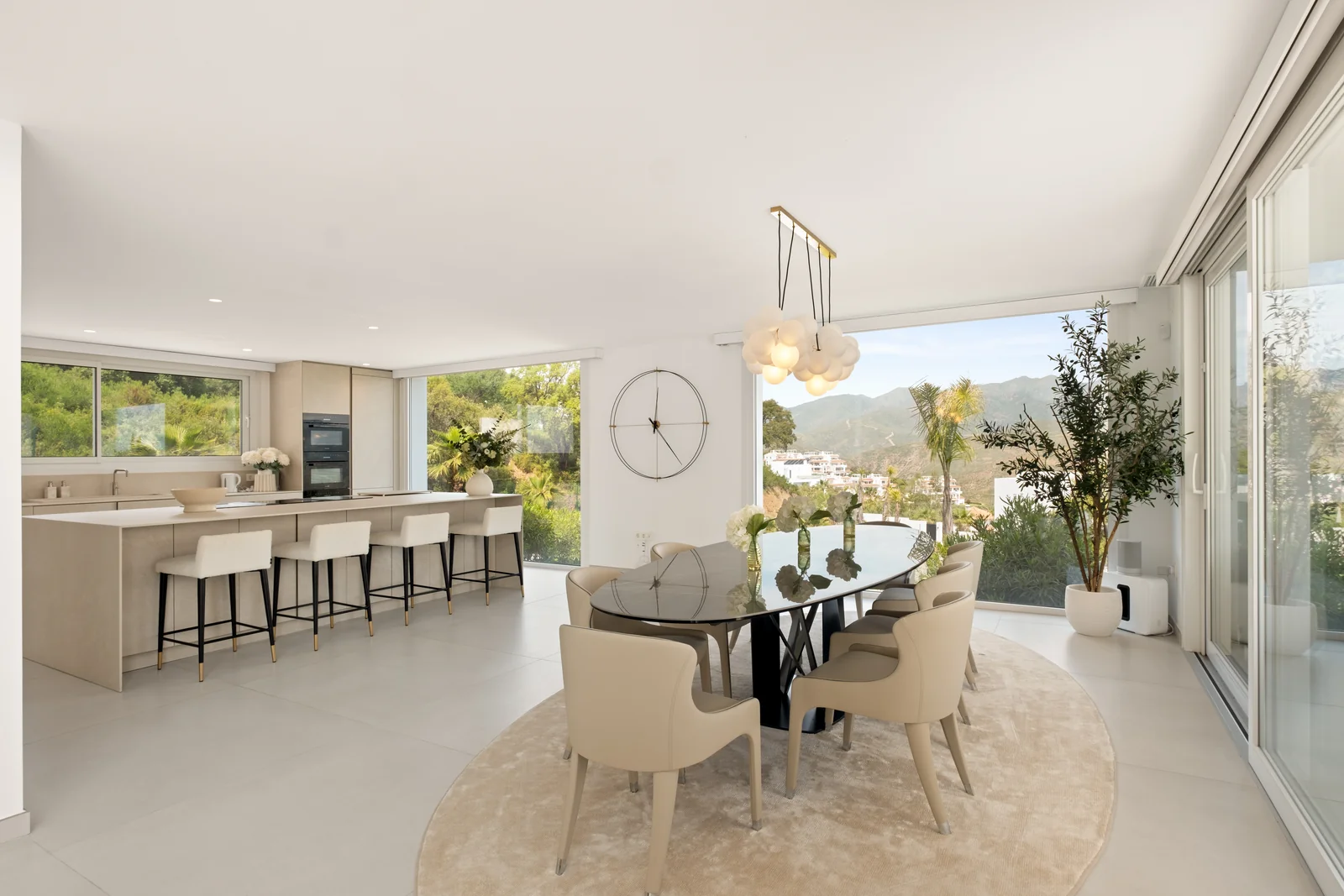 Buganville Villa open-plan kitchen and dining space with mountain views
