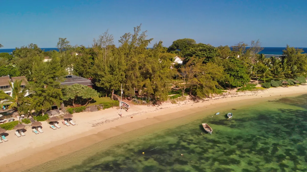 Aerial view of a beach on Mauritius’s east coast with clear turquoise water