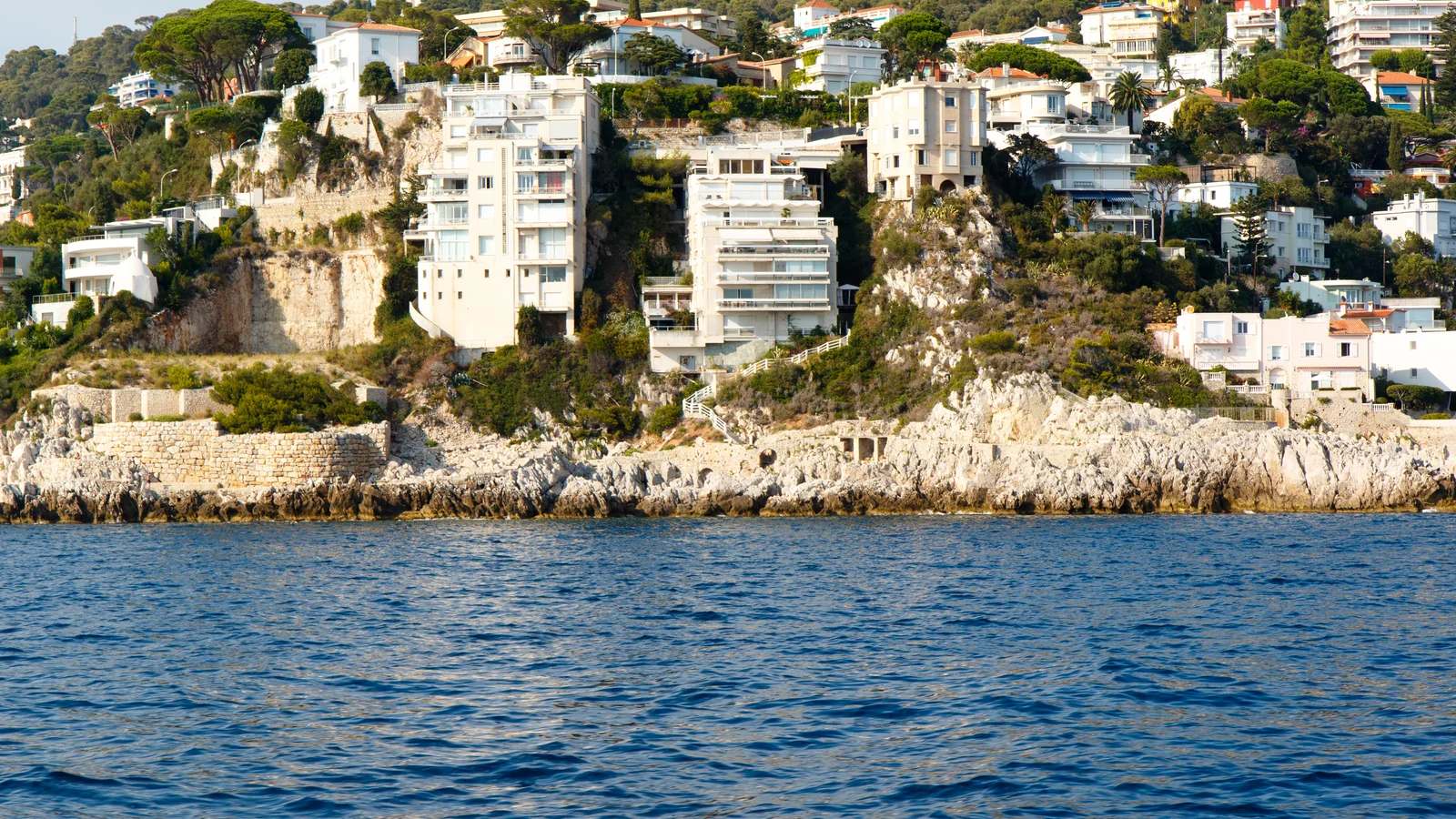 Luxury clifftop villas above the deep-blue Mediterranean on a stretch of scarce prime coastline