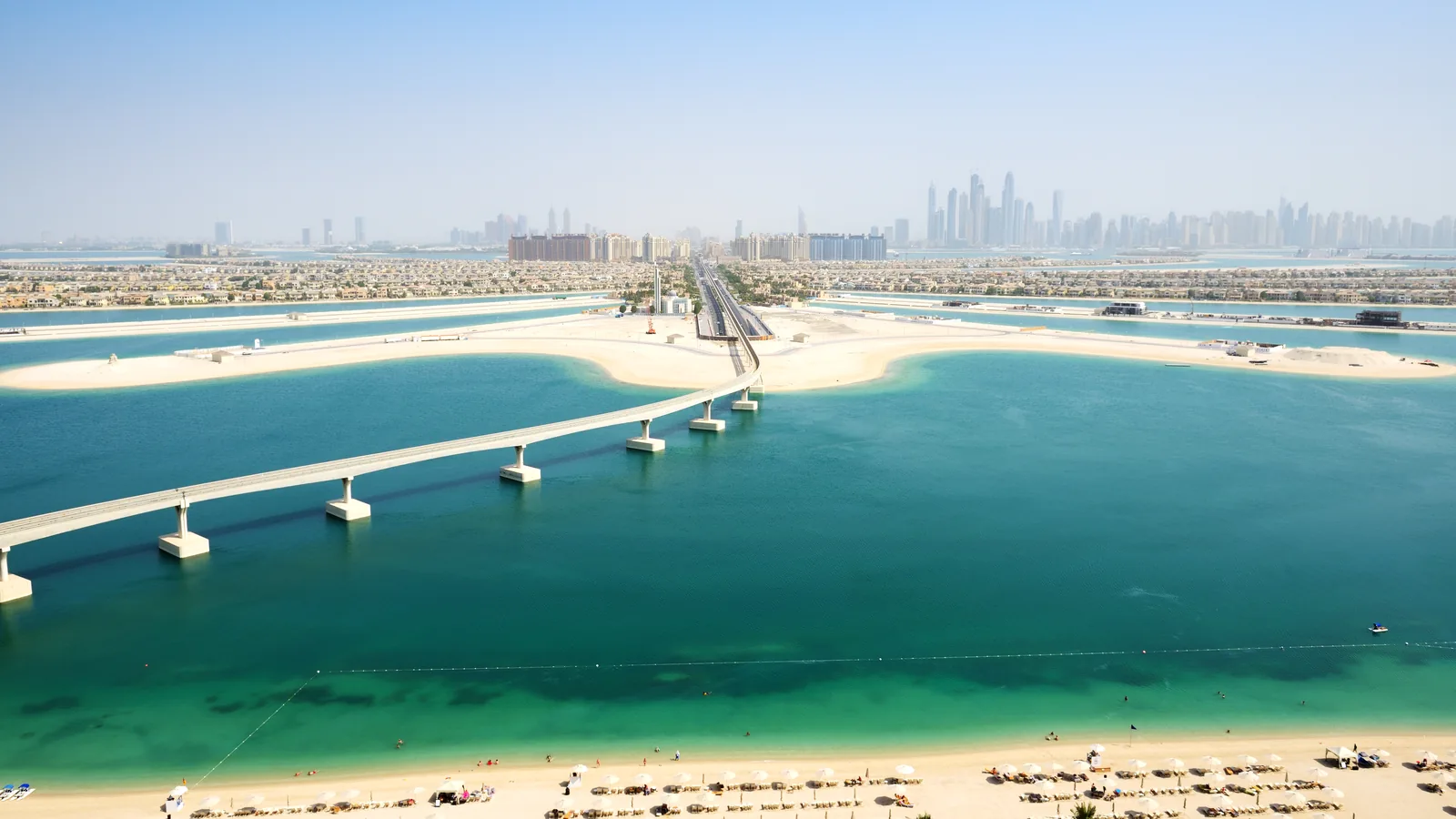 Aerial view of Palm Jumeirah and the Dubai Marina skyline, the UAE's leading destination for migrating global wealth