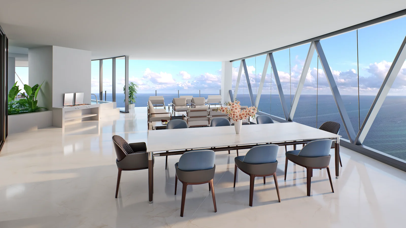 Bentley Residences wraparound terrace with outdoor dining and ocean views