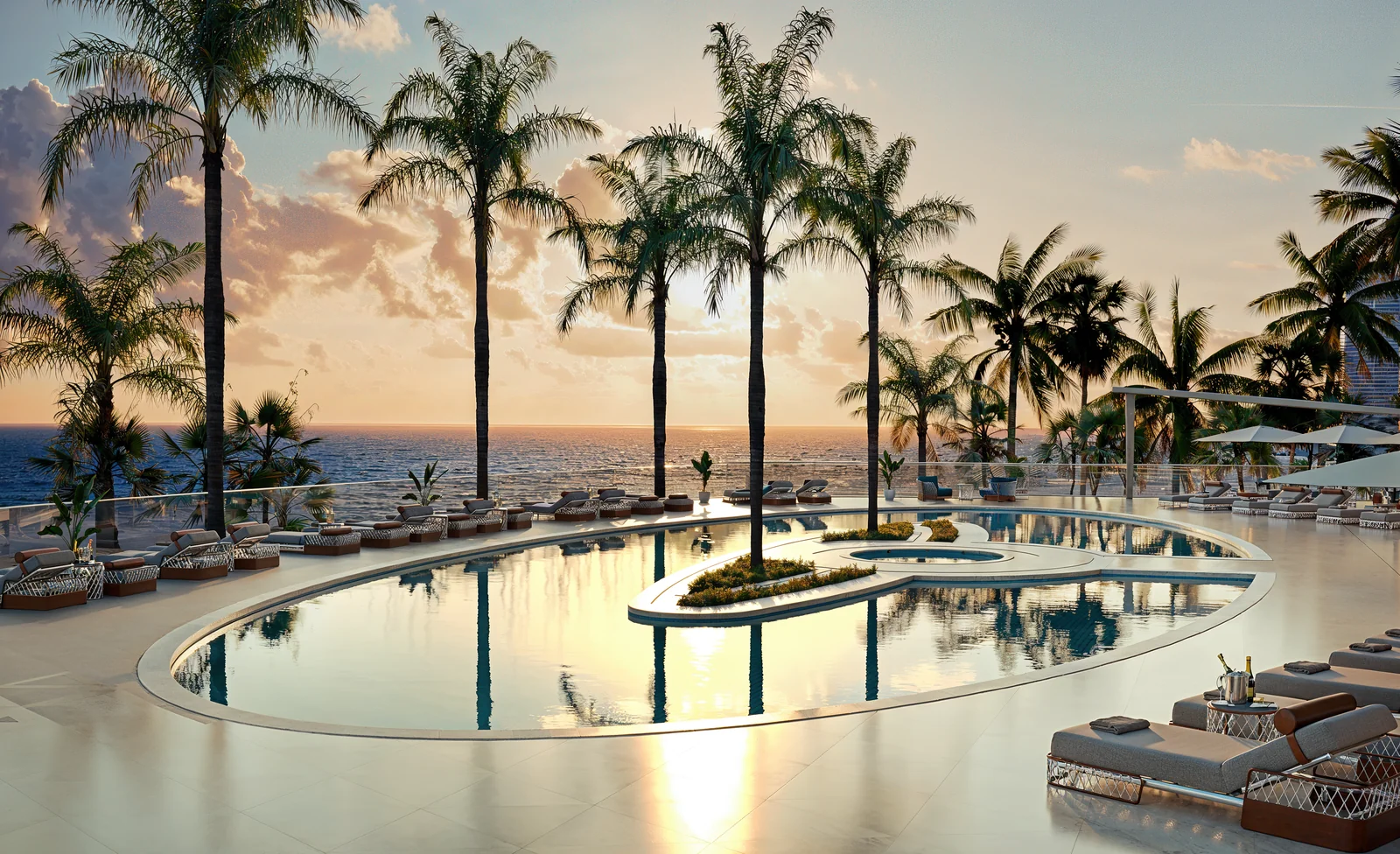 Bentley Residences pool deck at sunset overlooking the Atlantic, Sunny Isles Beach