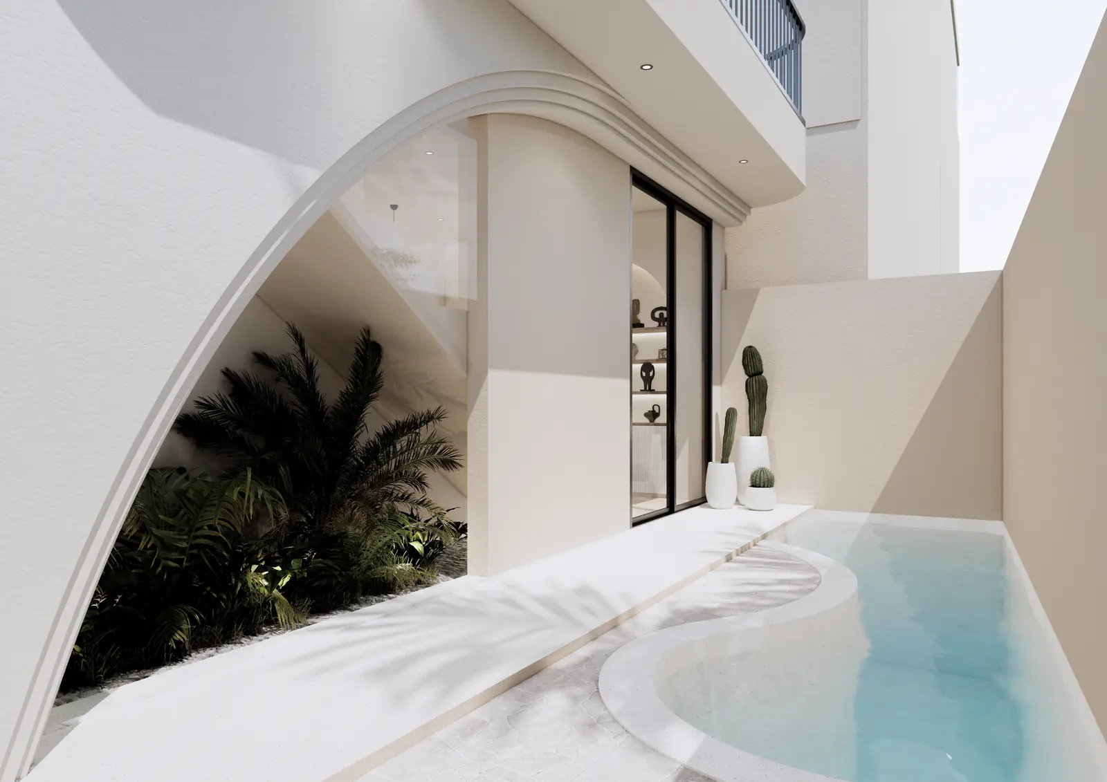 The Coco Boulevard villa private plunge pool framed by an arched wall