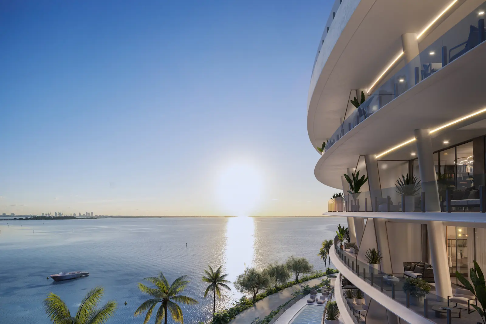 Vita at Grove Isle curved waterfront facade at sunset over Biscayne Bay, Coconut Grove Miami
