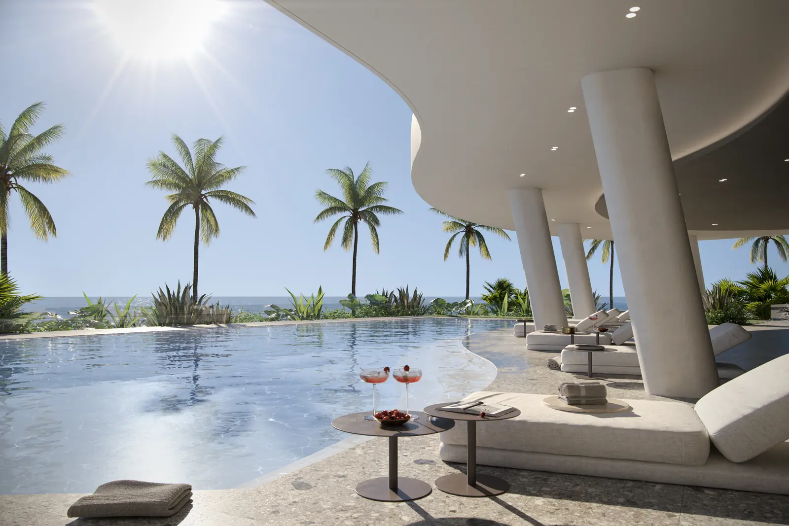 Vita at Grove Isle bayfront infinity pool with palms and Biscayne Bay, Coconut Grove Miami