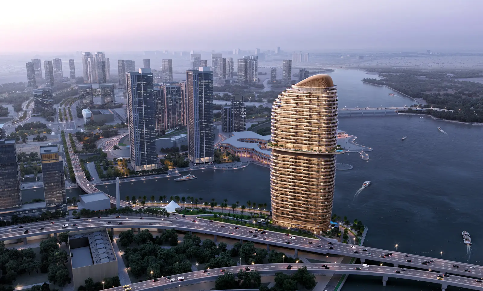 Jumeirah Residences illuminated at dusk on the Al Maryah Island waterfront, Abu Dhabi