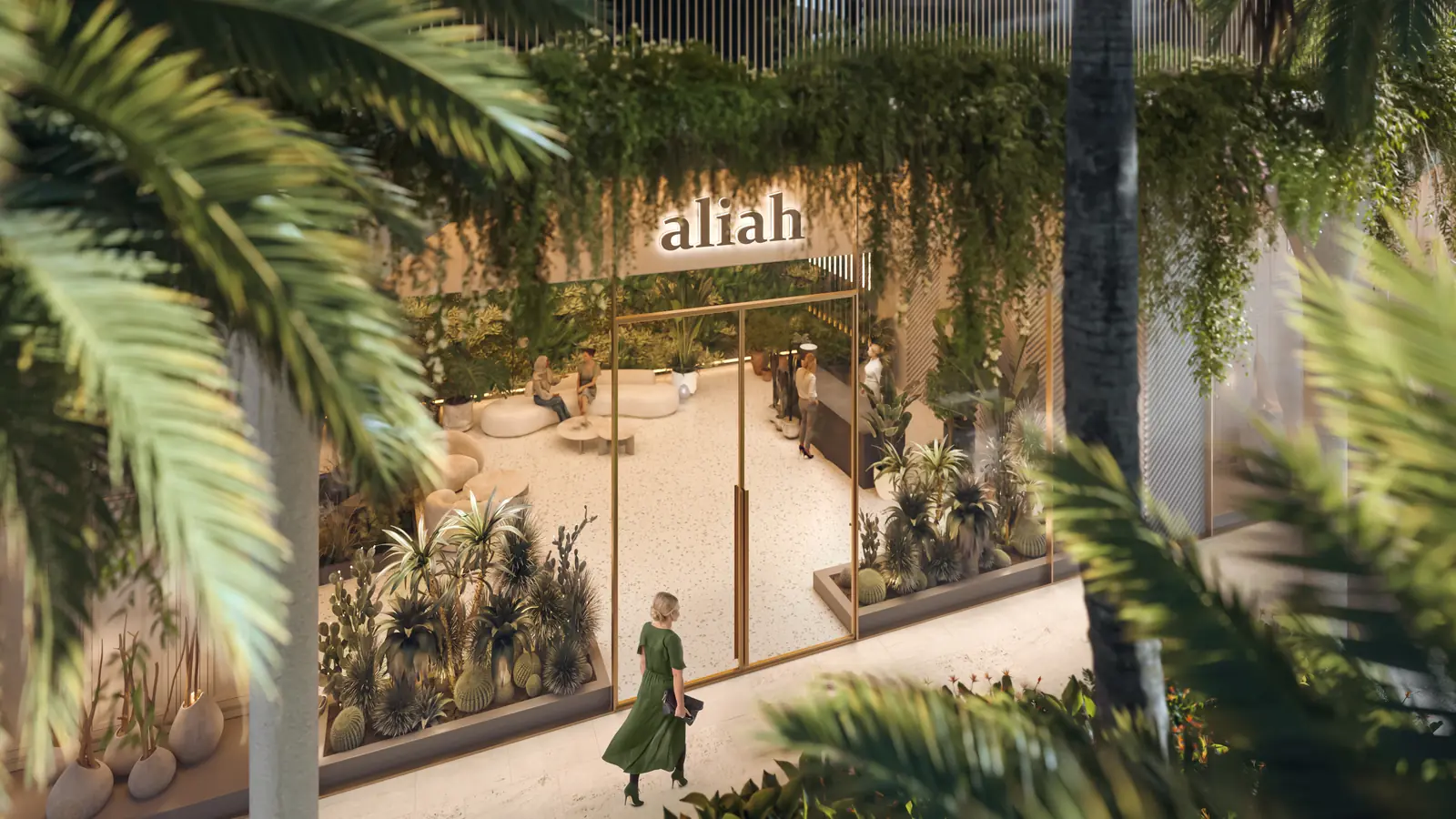 The Row Saadiyat boutique retail storefront set among garden landscaping