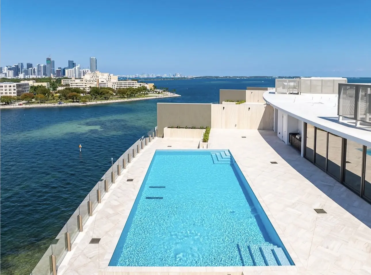 Vita Grove Isle penthouse rooftop pool with Miami skyline and Biscayne Bay views, Coconut Grove