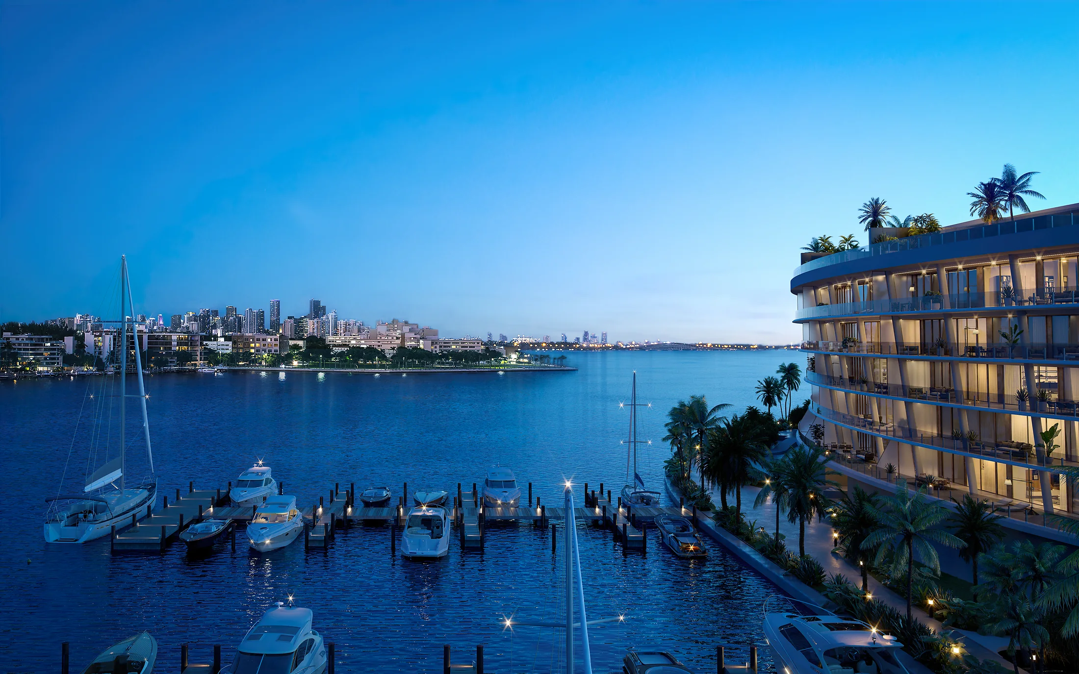 Vita at Grove Isle private marina with boats and Miami skyline across Biscayne Bay, Coconut Grove