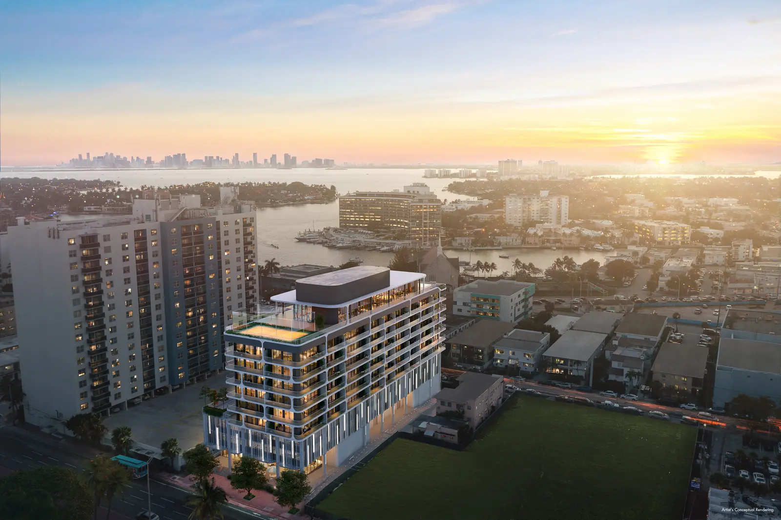 Ella Miami Beach aerial at sunset with Biscayne Bay and Downtown Miami skyline beyond, North Beach