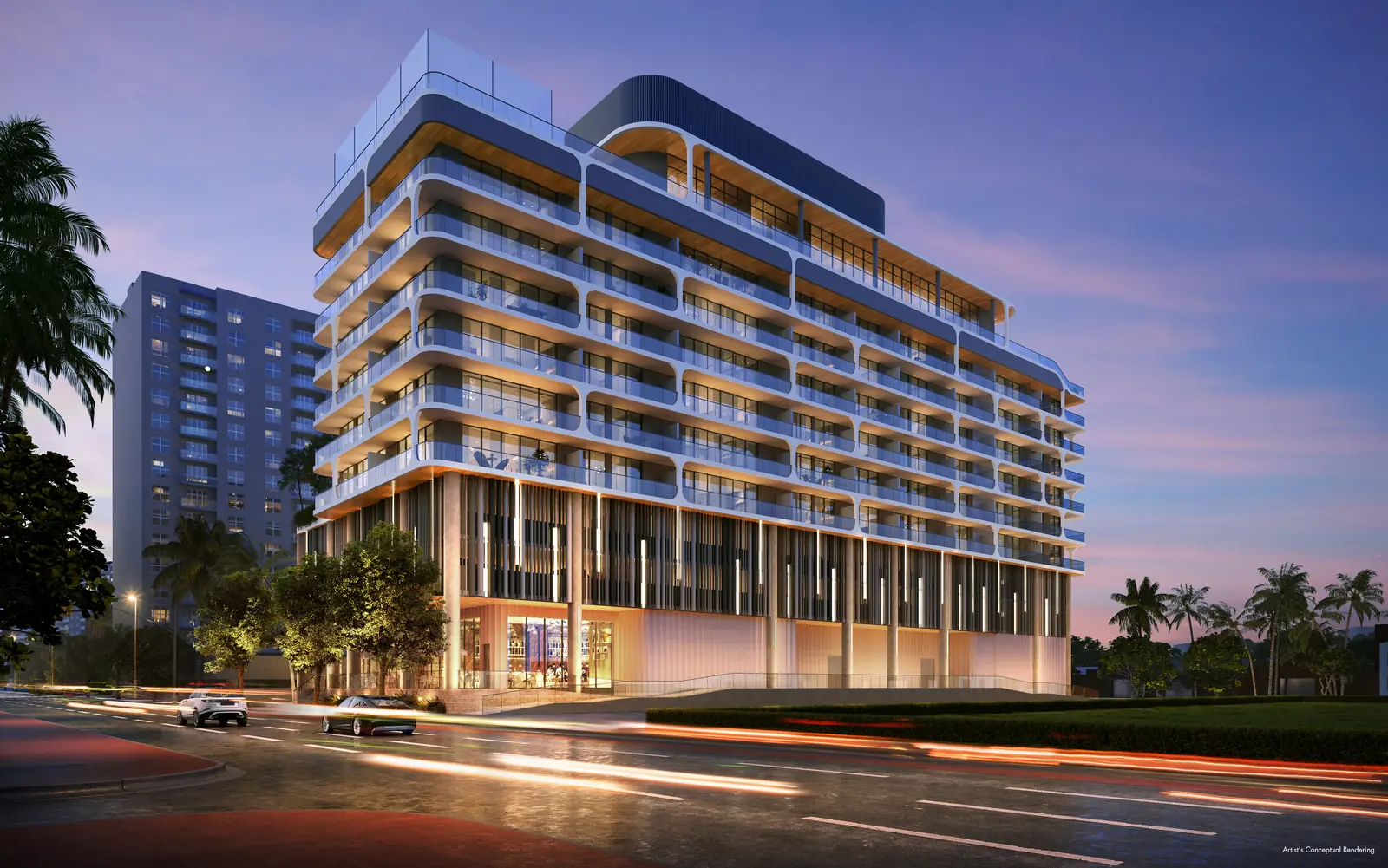 Ella Miami Beach curved balcony facade illuminated at dusk on Abbott Avenue, North Beach Miami Beach
