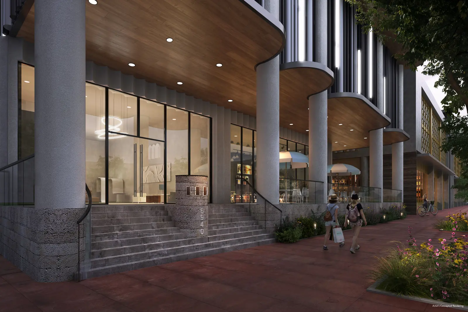 Ella Miami Beach lobby entrance lit at evening with covered paseo and cafe seating, North Beach Miami Beach