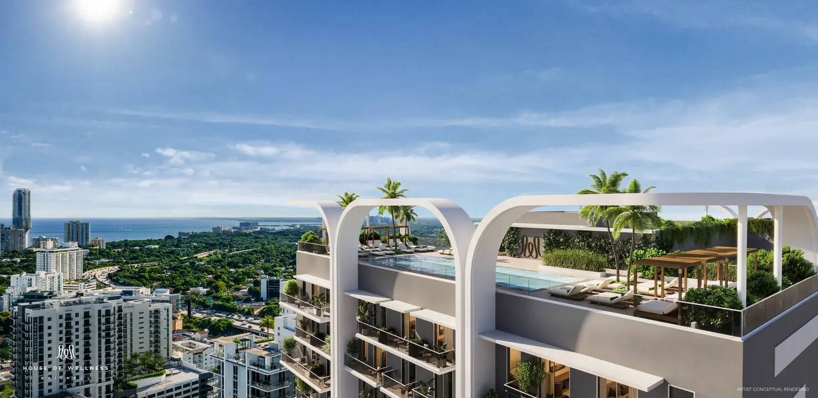House of Wellness Brickell rooftop pool deck with palms overlooking Biscayne Bay, Miami