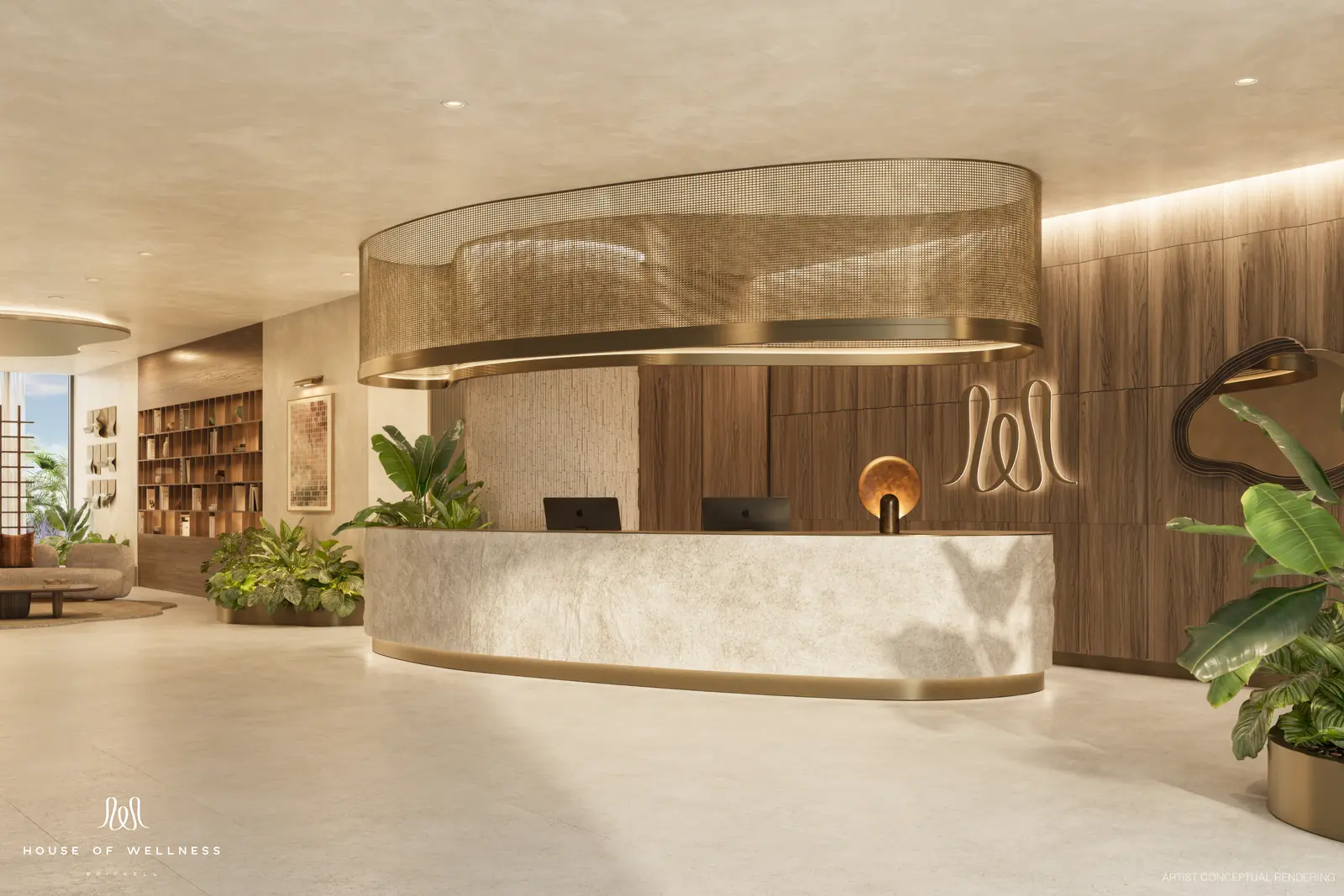 House of Wellness Brickell lobby with curved stone reception desk, timber walls and library shelving