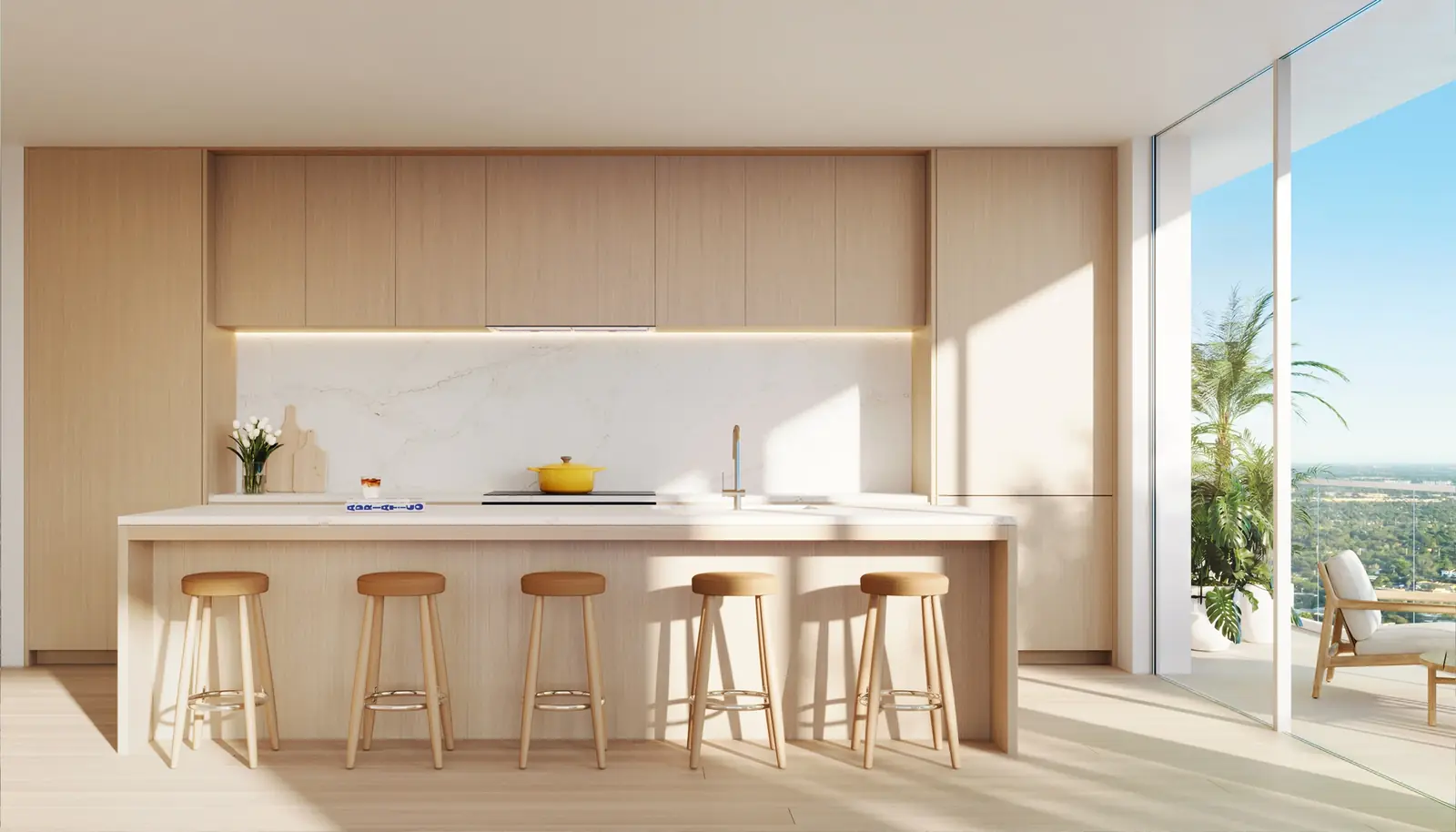 Viceroy Residences Fort Lauderdale kitchen with white oak millwork and honed quartz island by Rockwell Group
