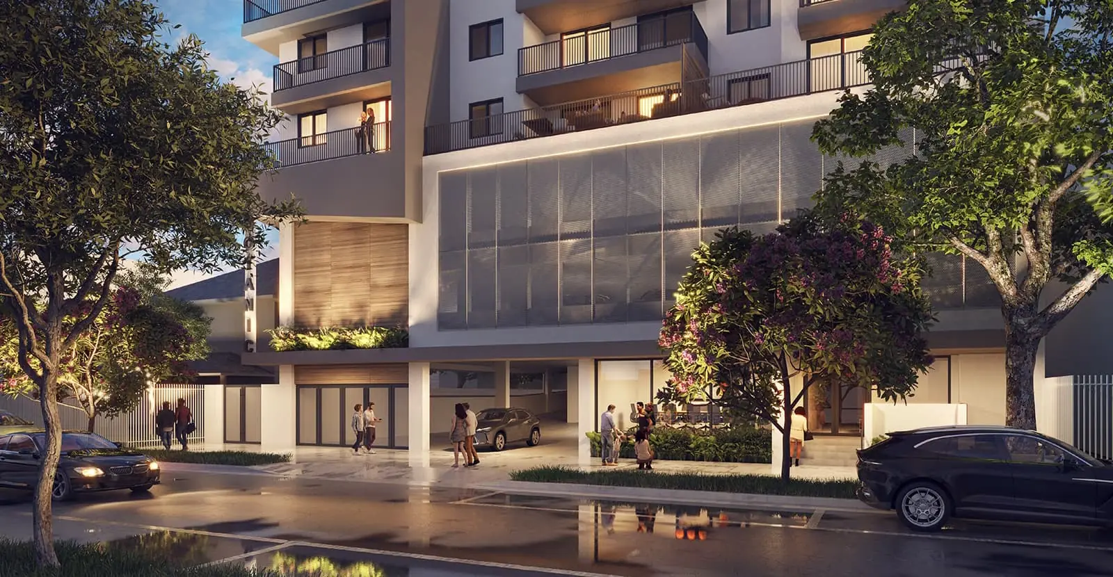 Botanic Residences street-level entrance and ground-floor glazing at dusk, West Brickell Miami