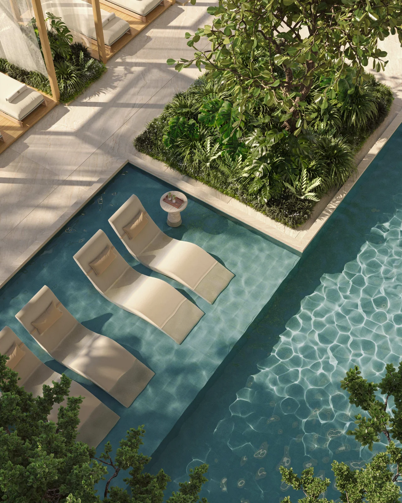 Banyan Tree Residences West Palm Beach Signature Pool from above with in-water loungers and planted borders