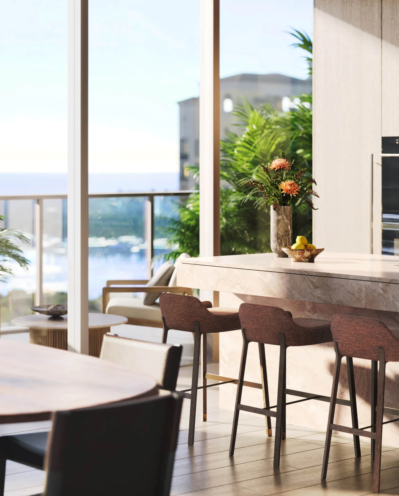 Banyan Tree Residences West Palm Beach kitchen and dining area with marble island and floor-to-ceiling glass