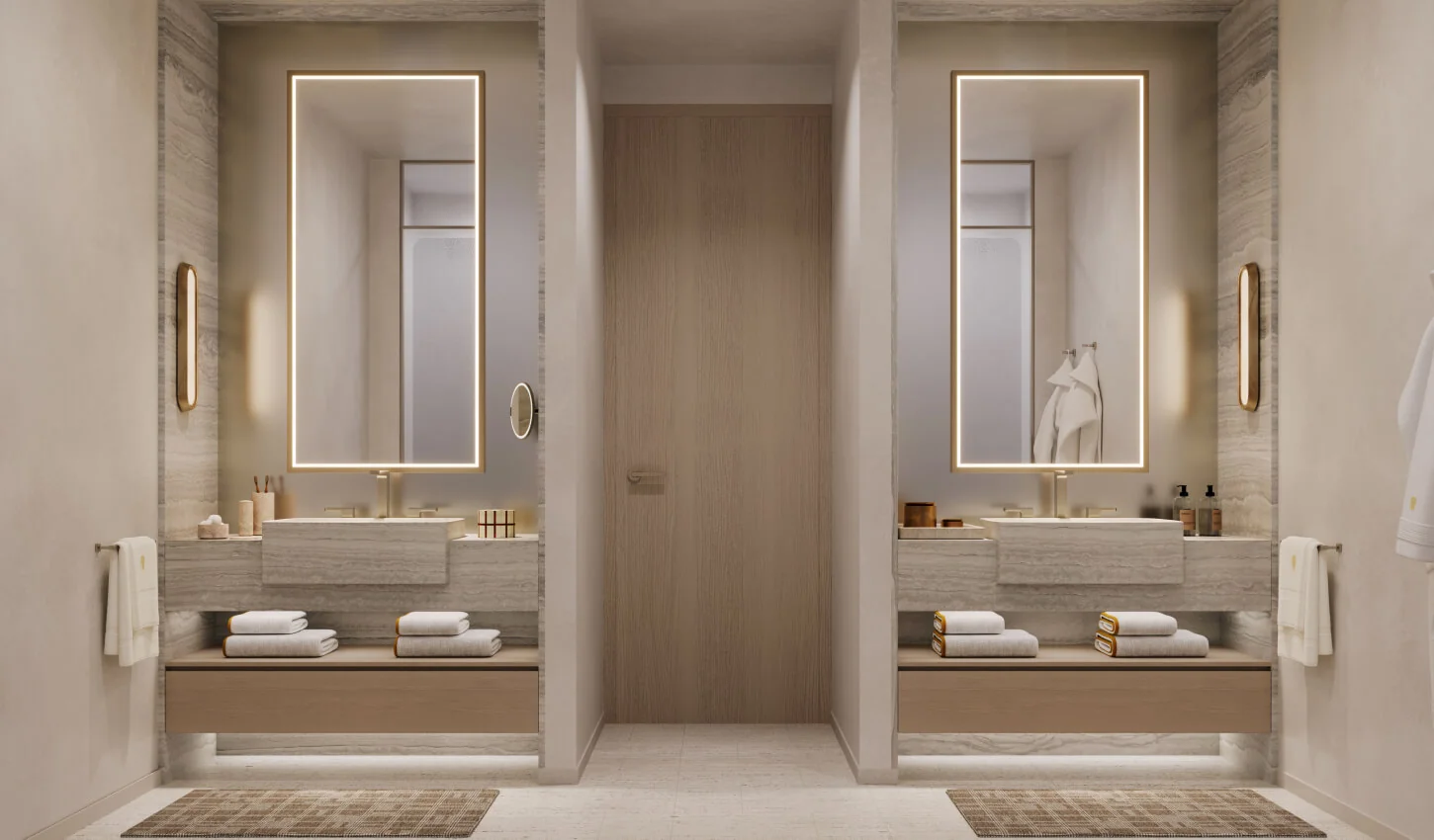 Banyan Tree Residences West Palm Beach dual vanity bathroom with backlit mirrors and brass fixtures