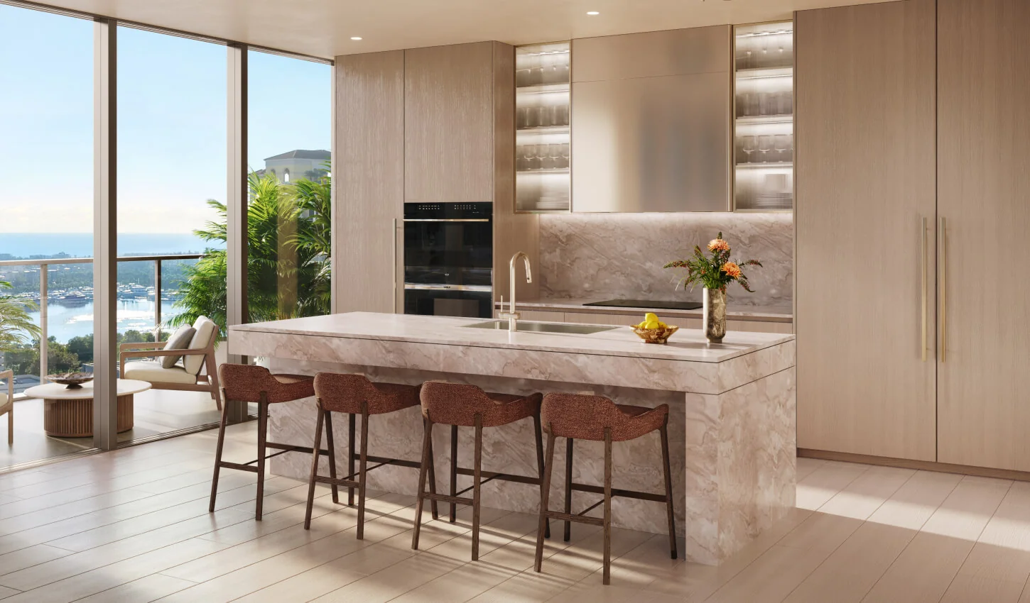 Banyan Tree Residences West Palm Beach great room kitchen opening onto a planted terrace with water views