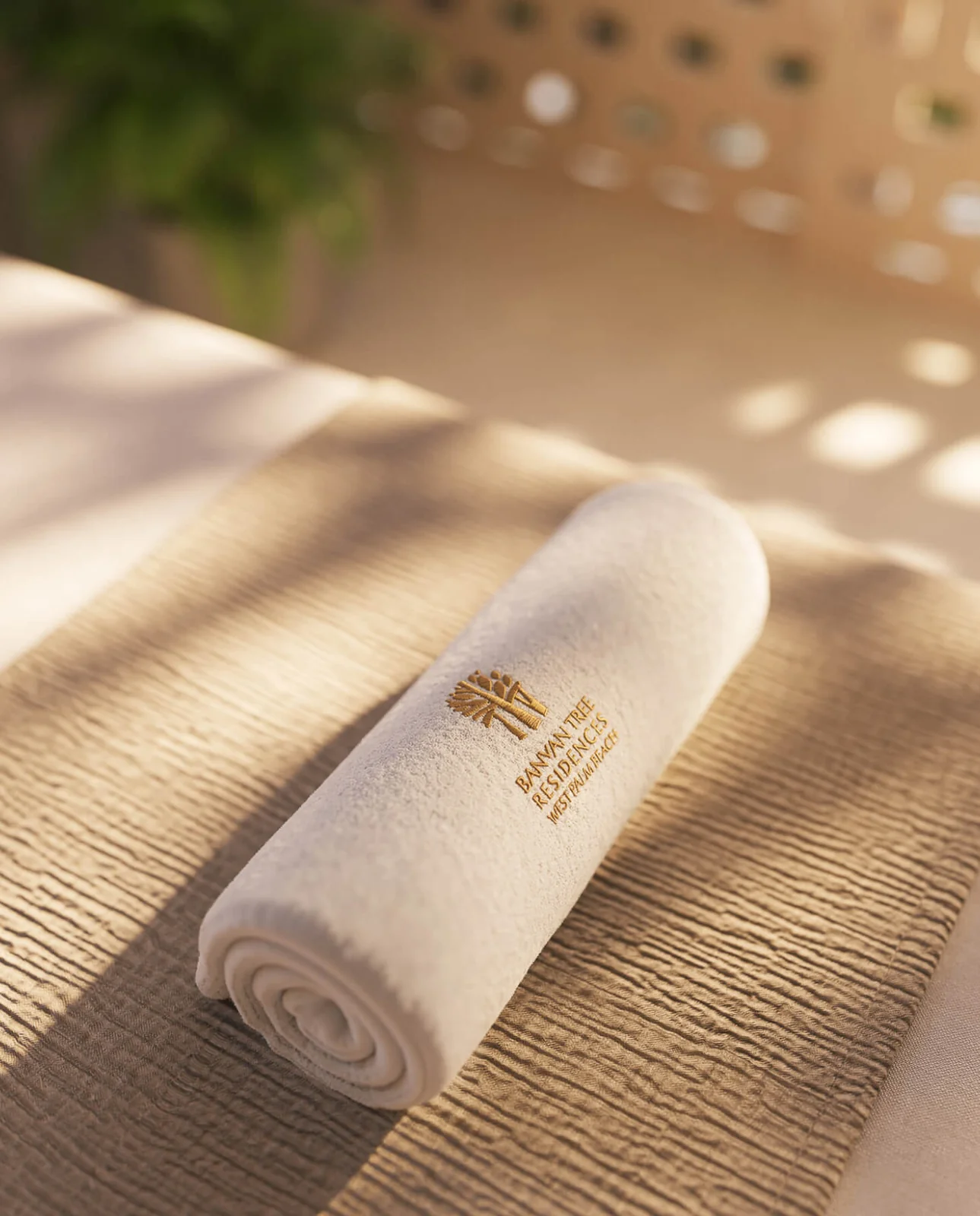 Banyan Tree Residences West Palm Beach rolled spa towel with the Banyan Tree emblem on the wellness floor