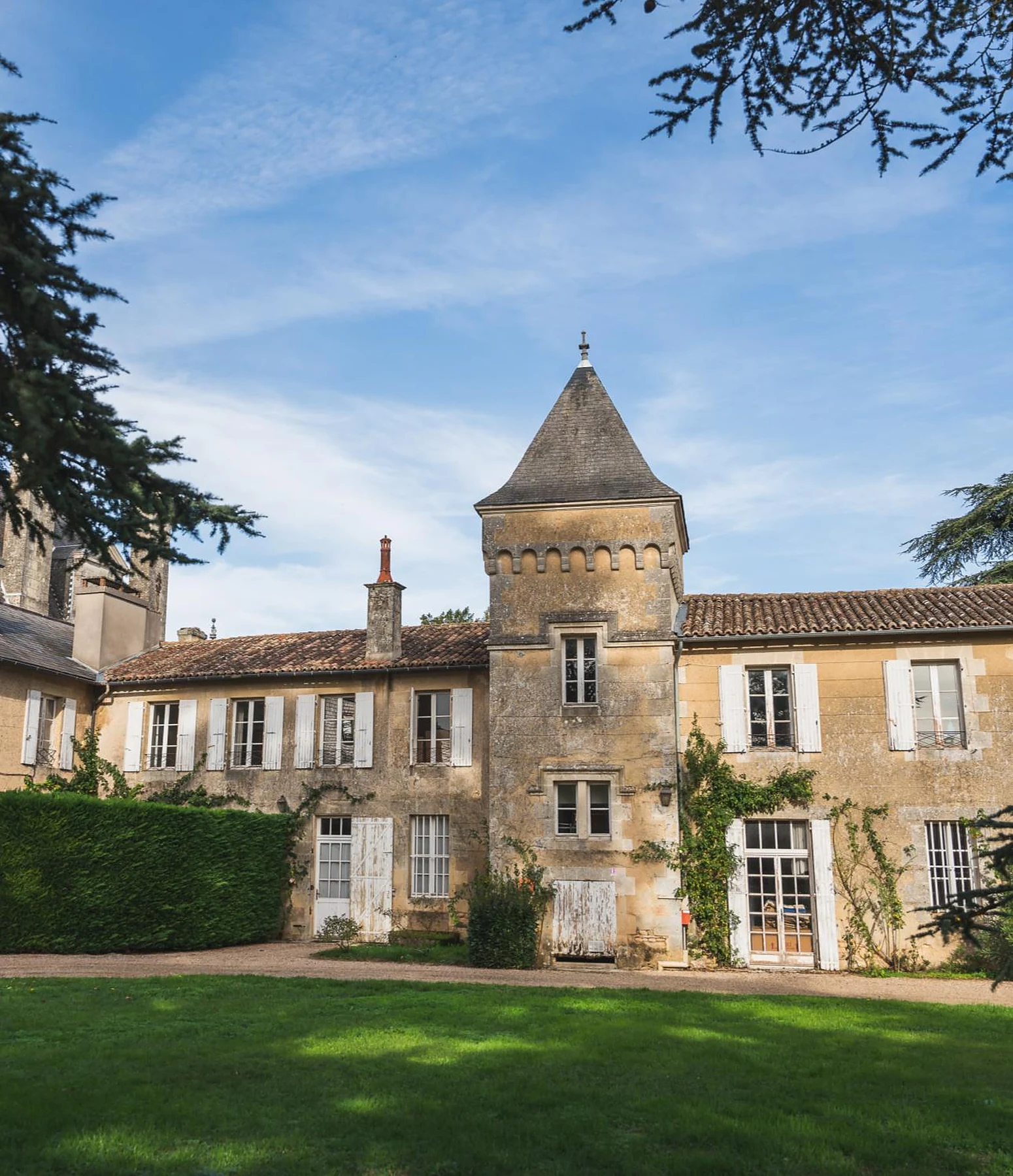 Private château estate 17th-century logis with corbelled stone tower and shuttered façade