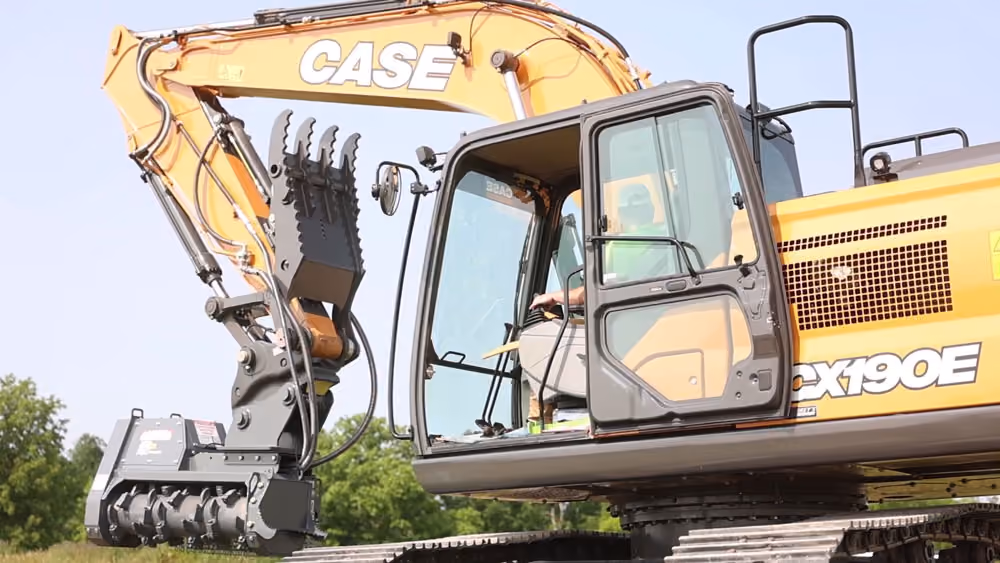 CASE excavator with a mulching attachment for land clearing