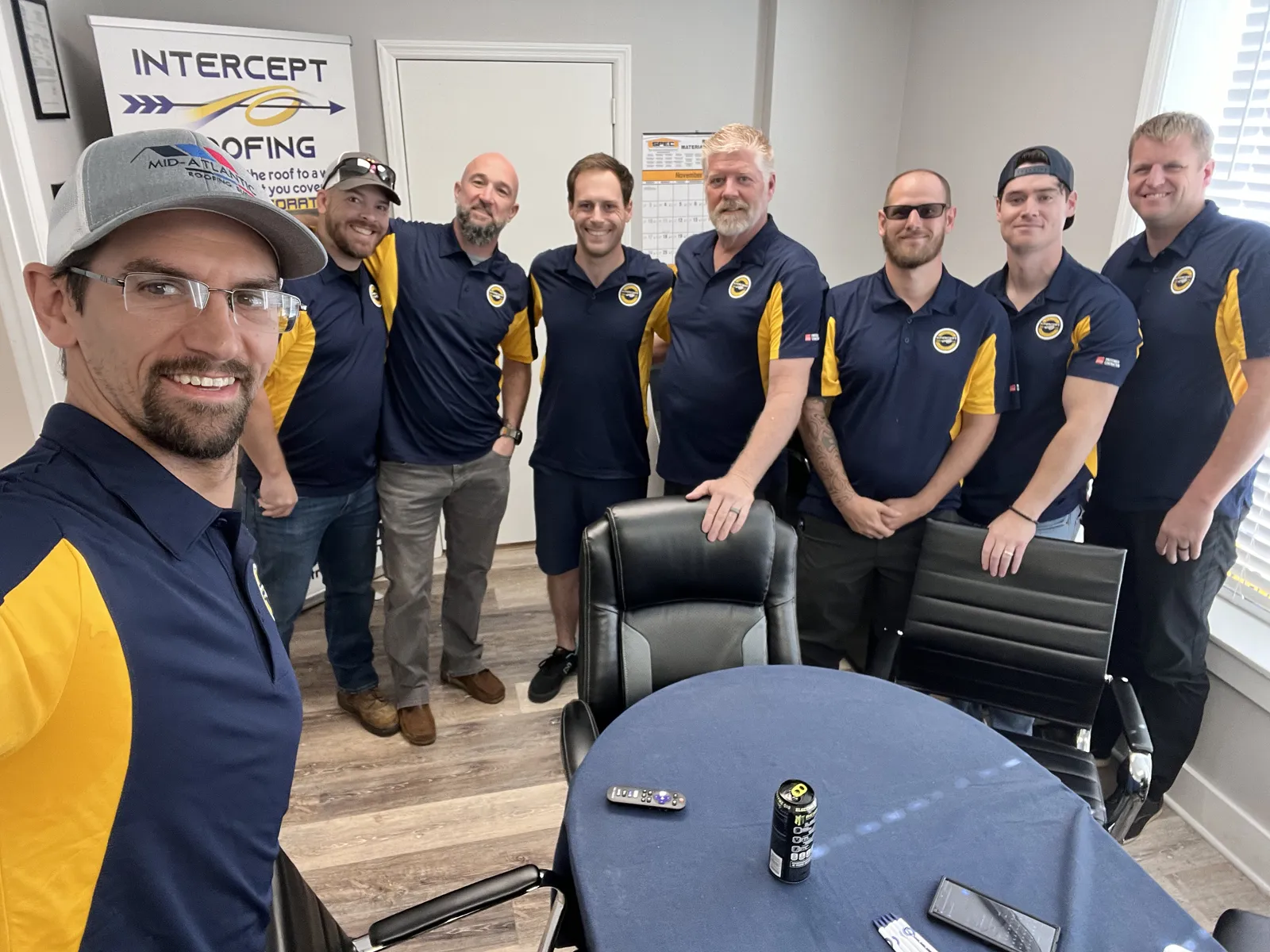 Intercept Roofing group of guys happy.