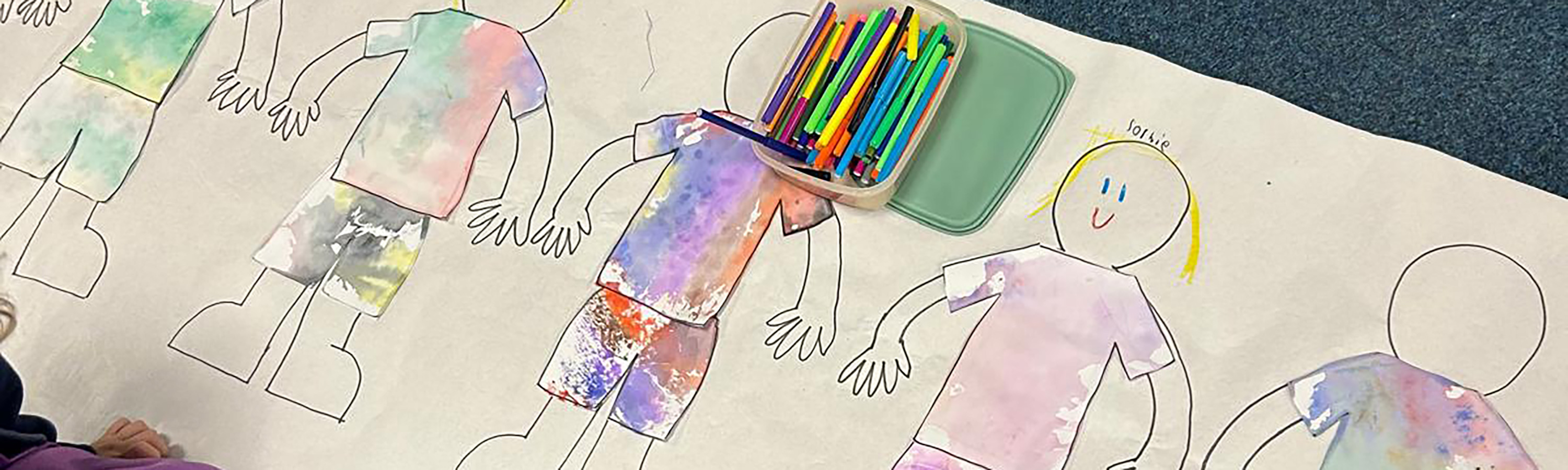 a collage image of a worker wearing a SensorZone tag, an Ai person detection camera, and a wheel loader 