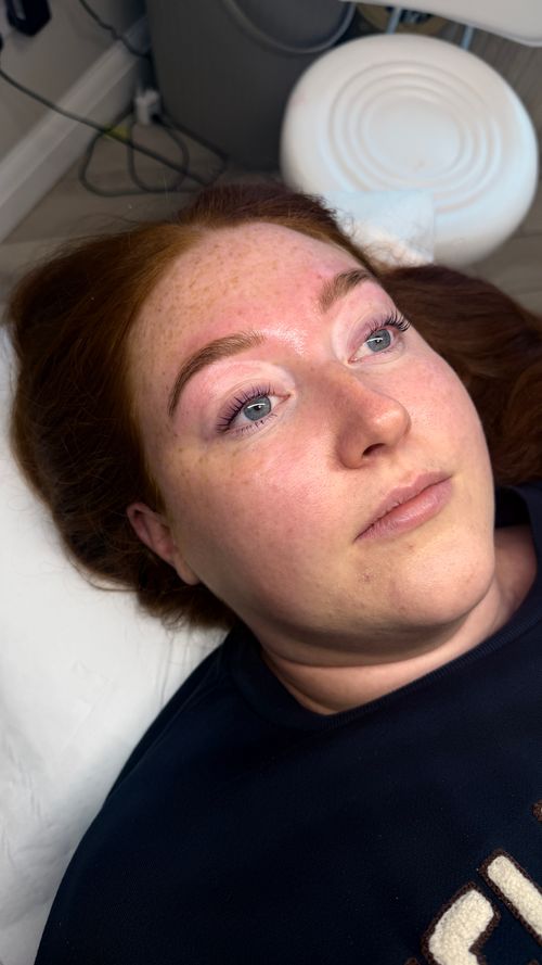 WOman laying on treatment bed at Ori Studio
