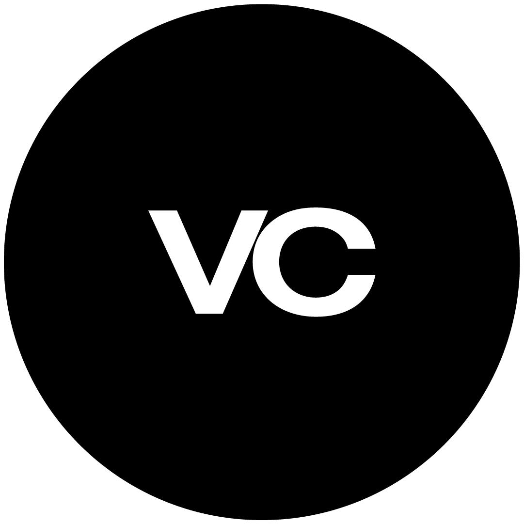 Black circular icon with white uppercase letters 'VC' centered.