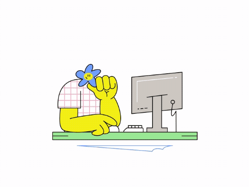 Animated yellow character with a blue flower face working at a computer desk.