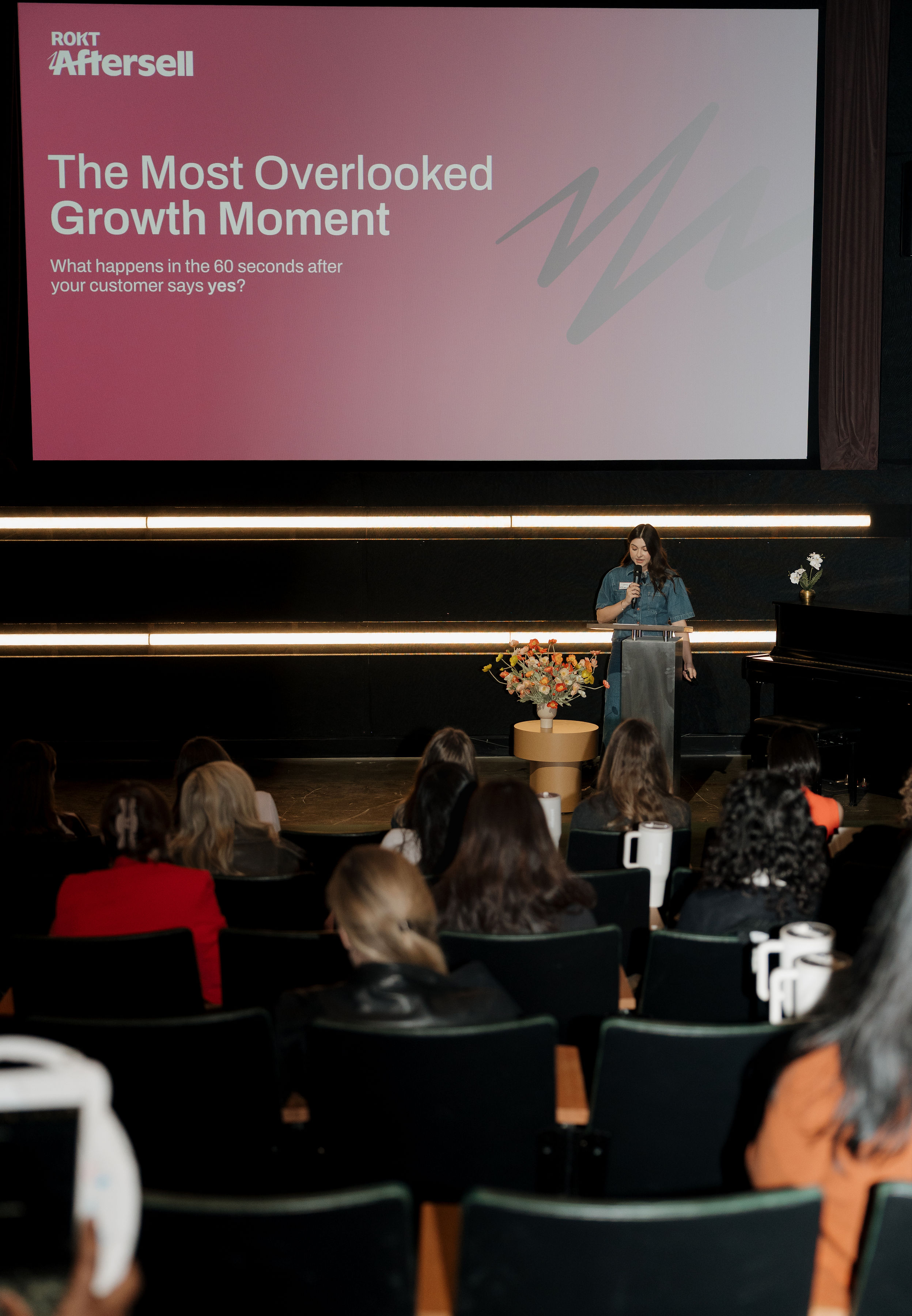 Group of people socializing in a dimly lit room