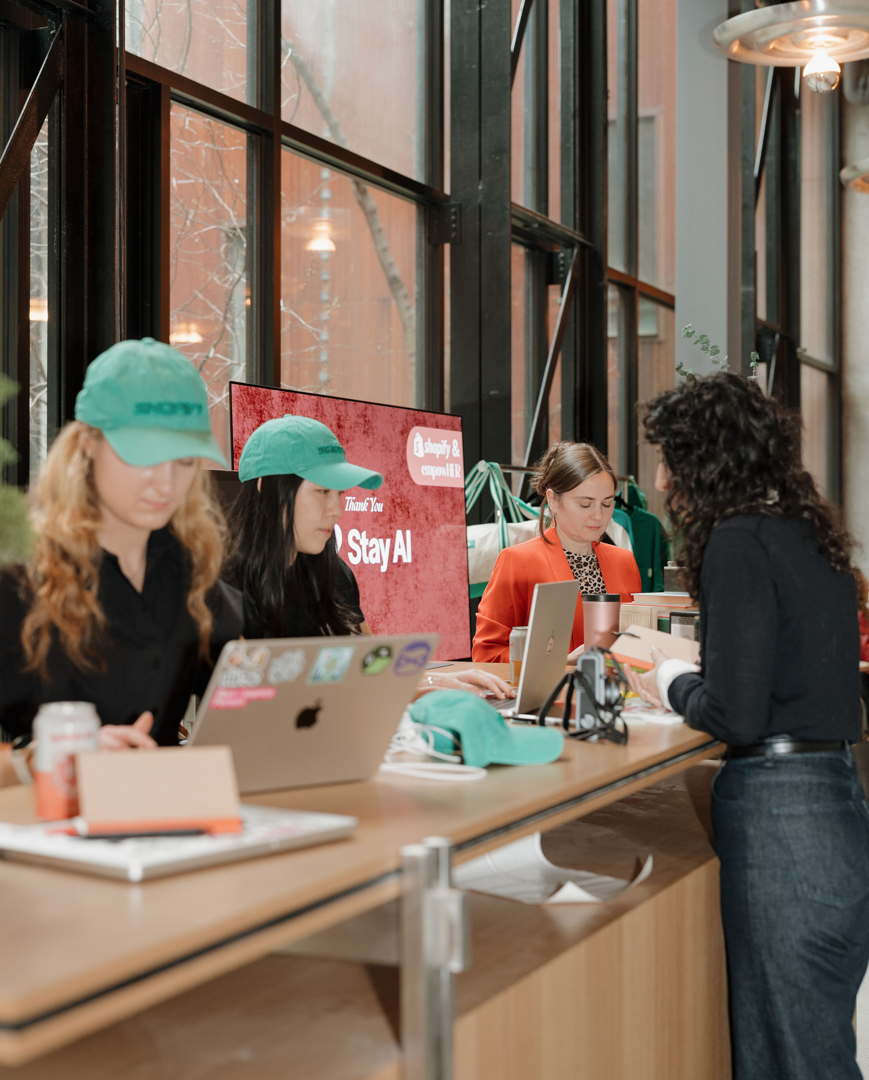Woman speaking at empowHER community event