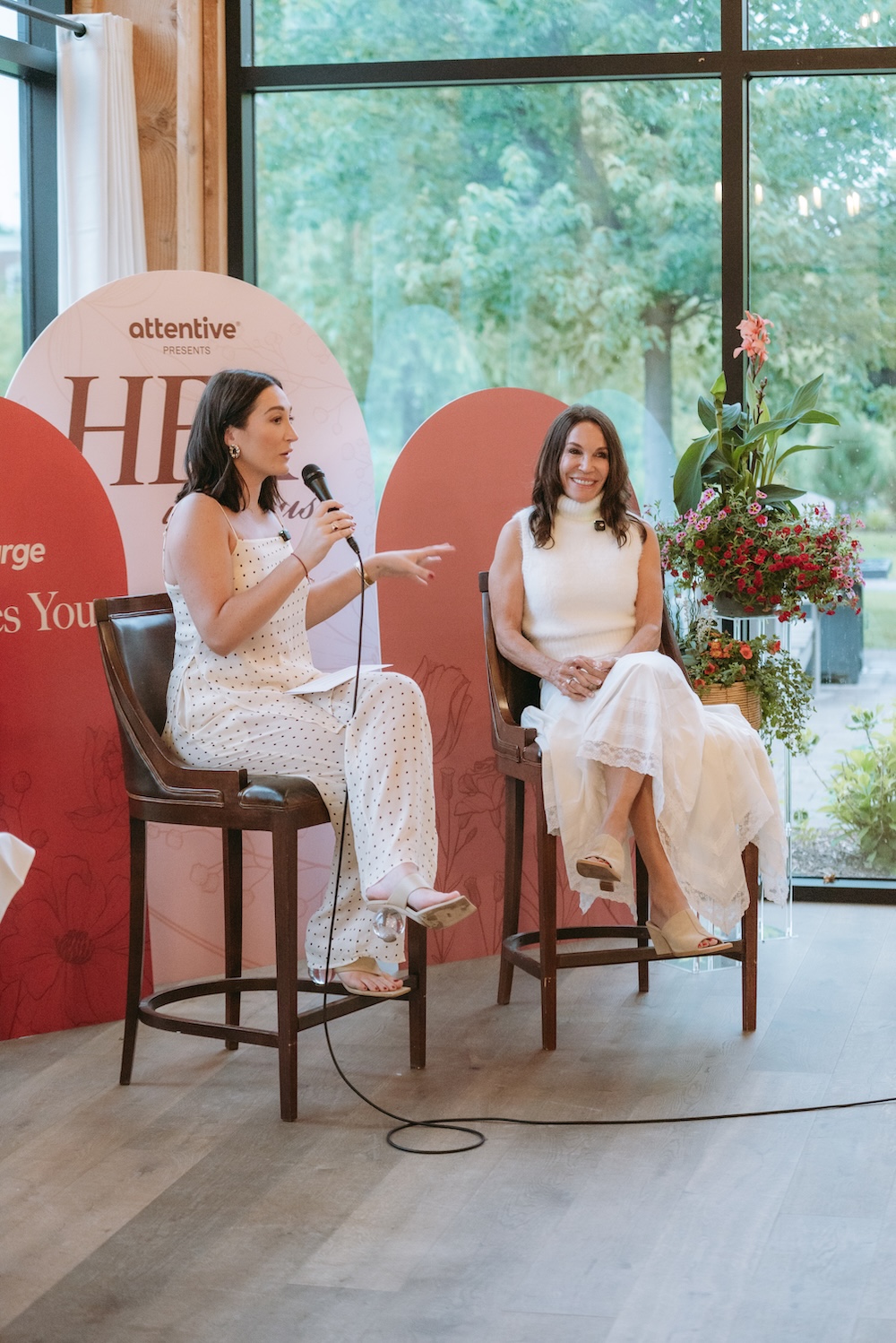 Woman speaking at empowHER community event