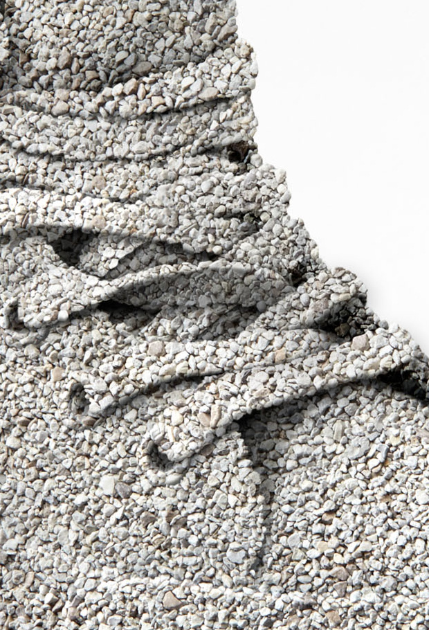 Cat litter sculpted into miniature mountain landscape in studio, Royal Canin campaign.