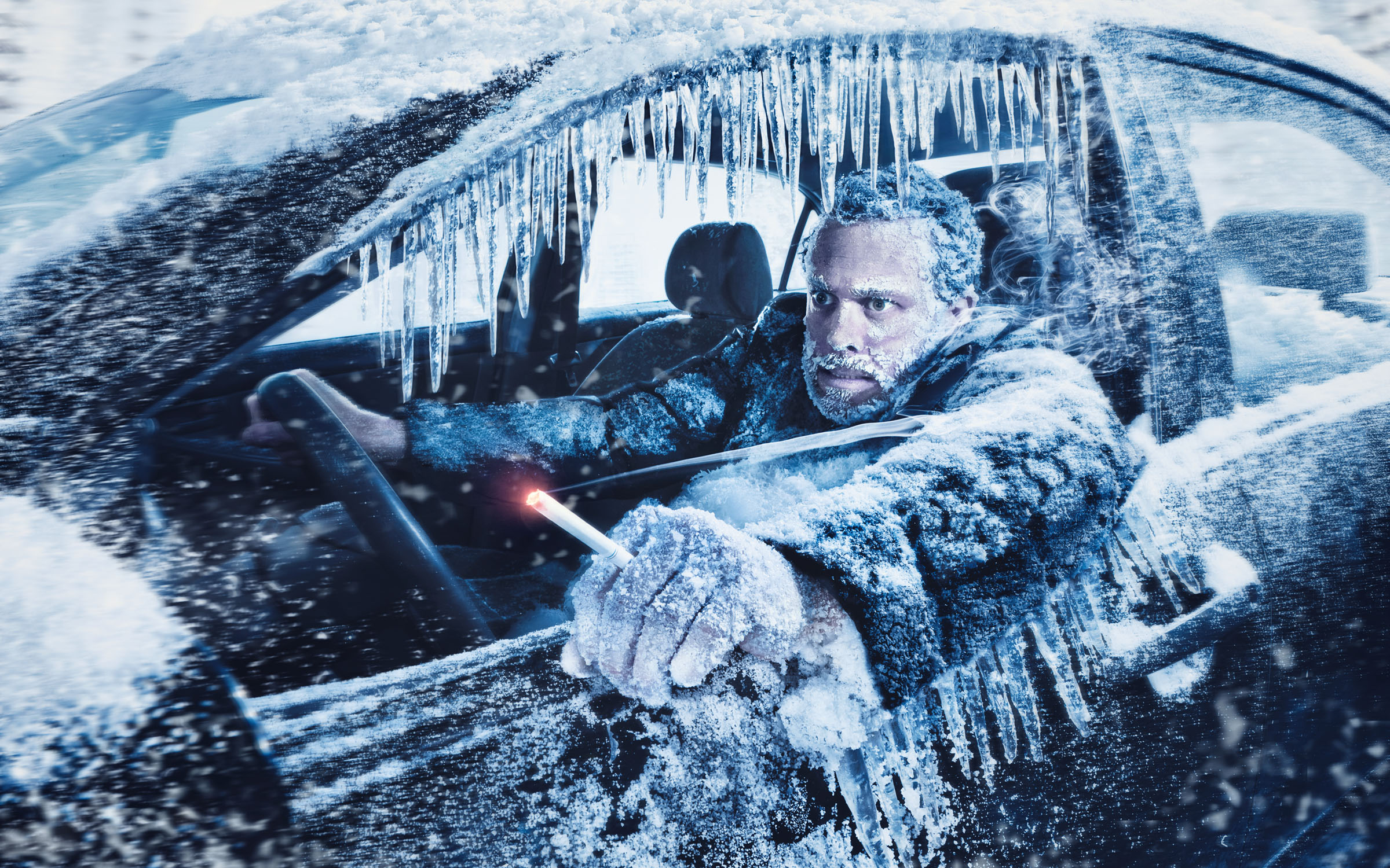 Man smoking while driving with the car window open in freezing winter conditions, Novartis Thrive gum campaign.
