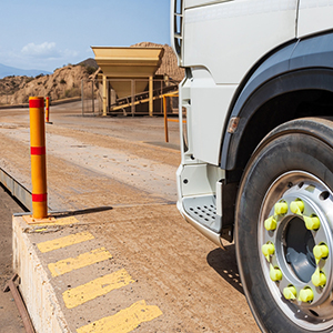 Truck driving onto weighbridge