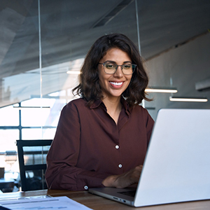 Female worker at a desk on her laptop
