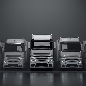 3 white trucks lined up in a row