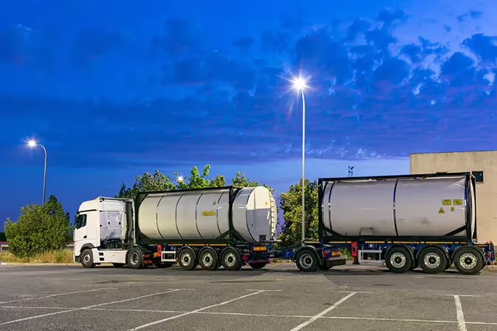 Liquid bulk truck stopped in car park