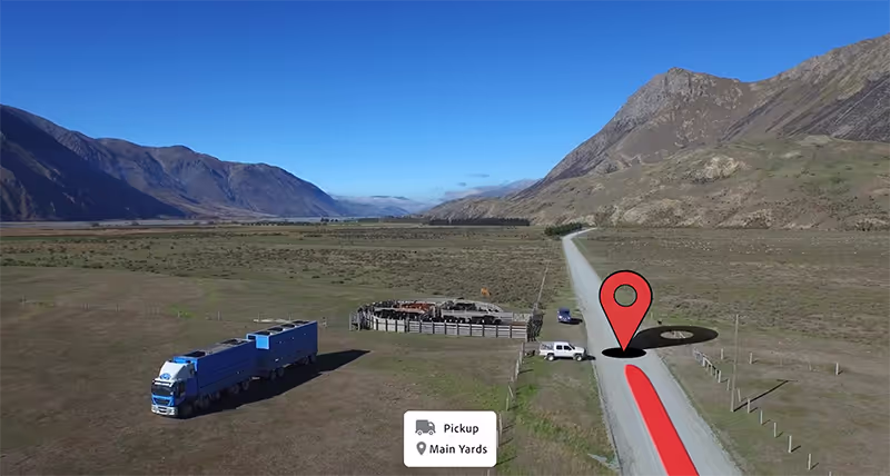 Livestock truck parked at loading zone in valley