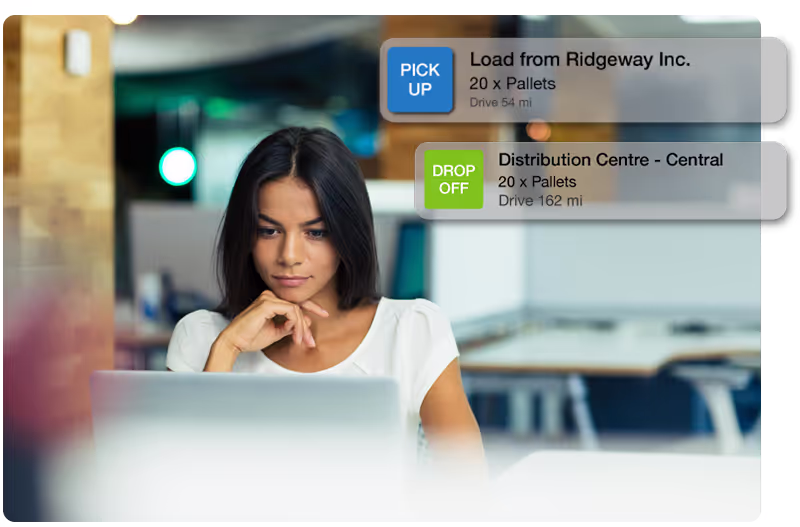 Female worker at desk with notification graphic call outs
