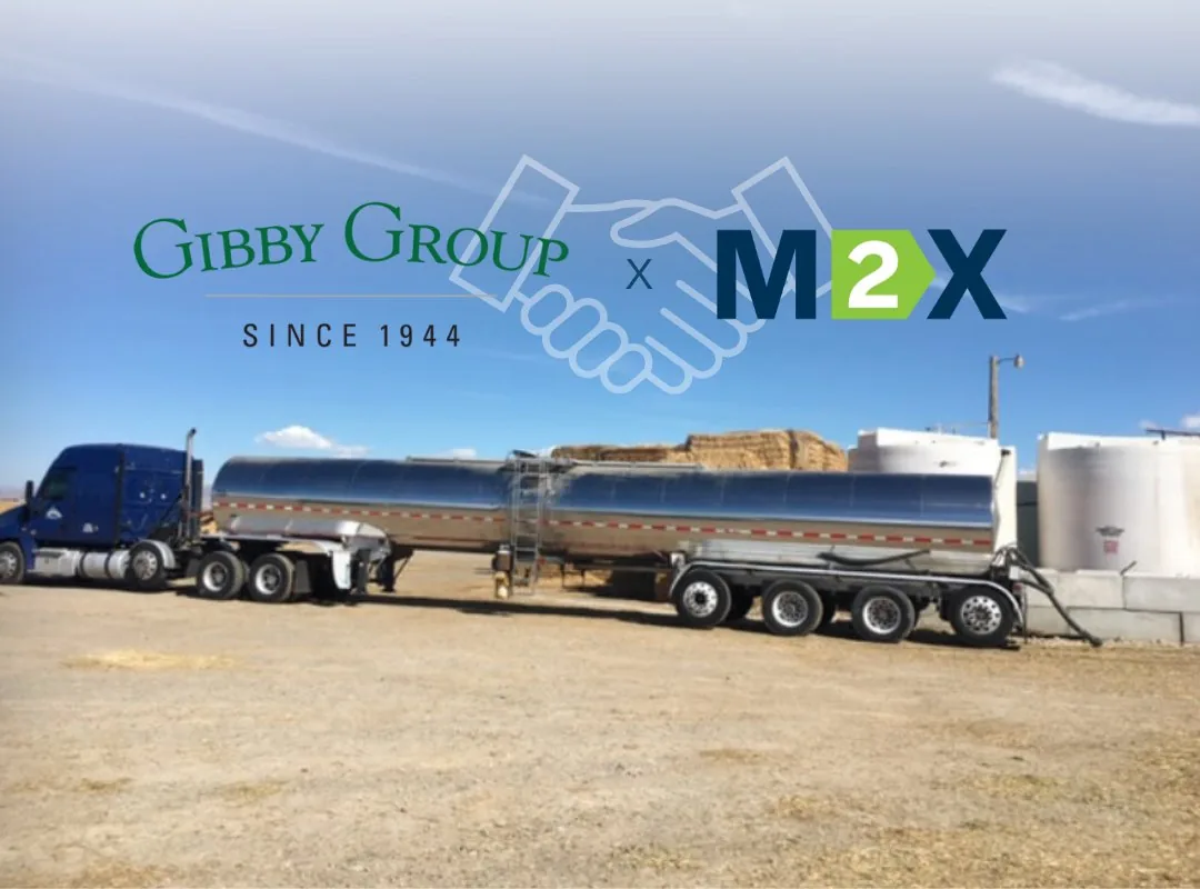 Gibby Group and M2X logos over a bulk liquid tanker truck