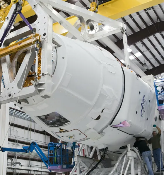 Workers assembling Space X capsule