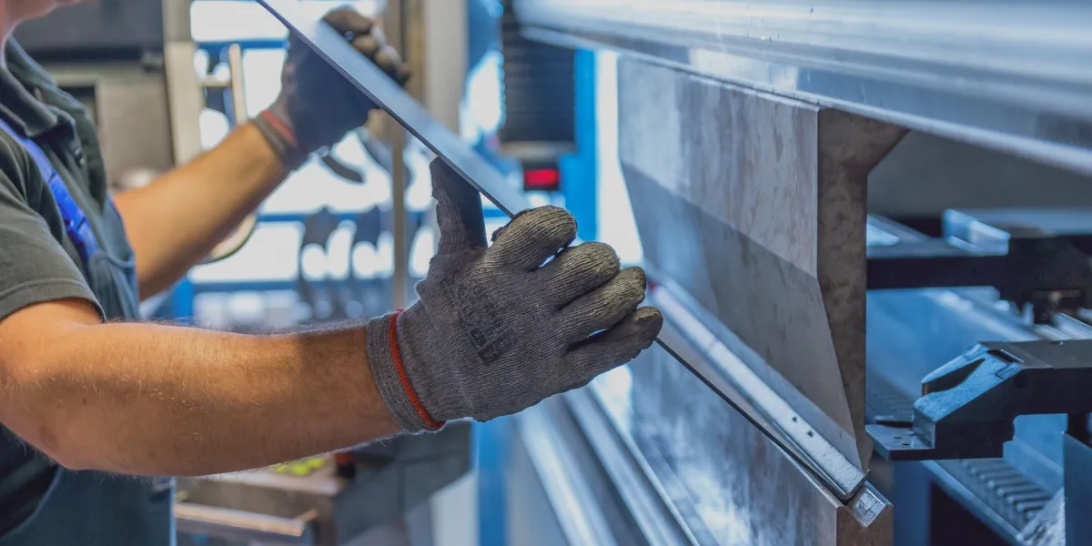 Worker using forming machine