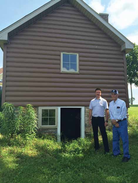 Jeff and his father standing outside 